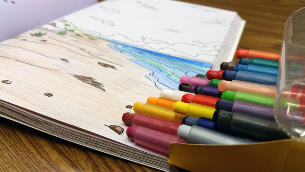 coloring book with crayons