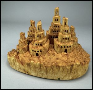 Uli Kirchner Entirely self-taught, Uli’s process blends imagination with technical skill. His tools include chainsaws, bandsaws, scroll saws, and sanders, with which he shapes wood.